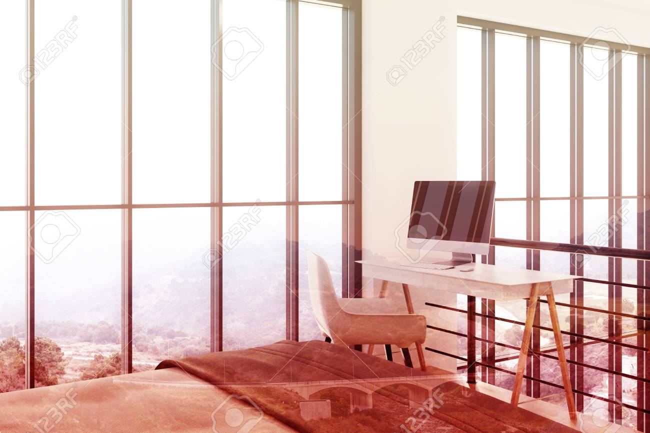 Home Office With A Small Table A White Chair And A Computer