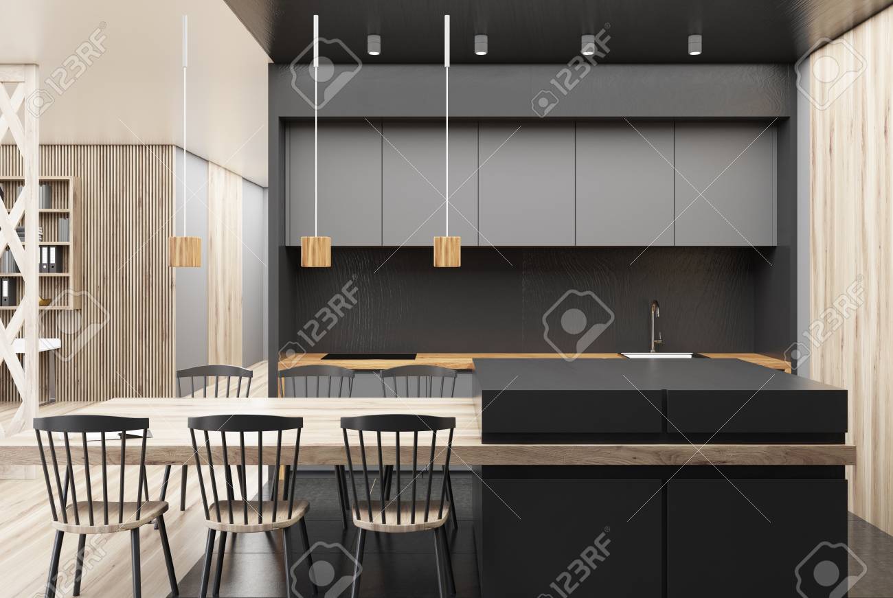 Black And Wooden Kitchen With A Gray Bar A Long Table With Chairs Stock Photo Picture And Royalty Free Image Image 91305678