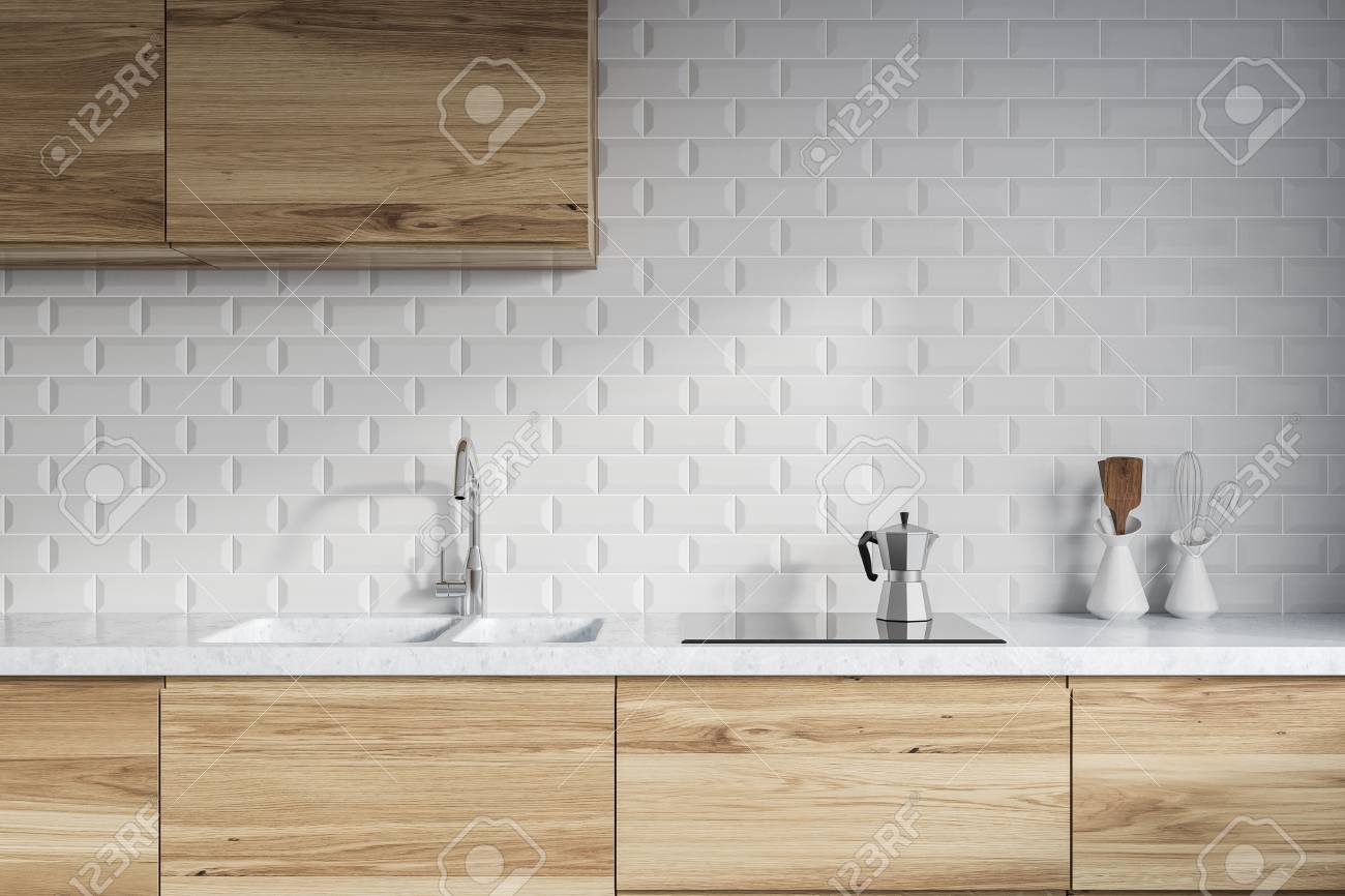 Modern Kitchen Interior With White Brick Walls Wooden Countertops Stock Photo Picture And Royalty Free Image Image 98422141