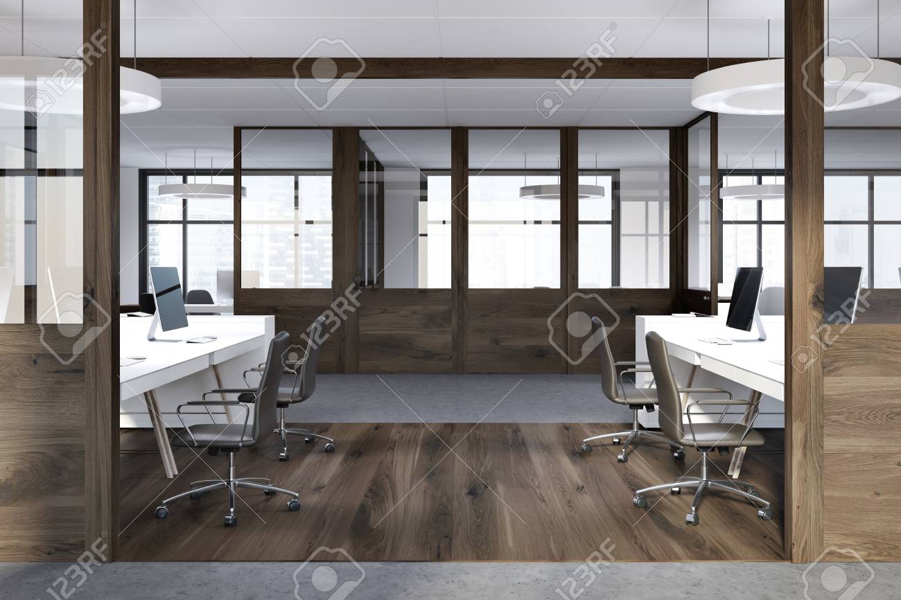 Side View Of A Modern Open Space Office With A Dark Wooden Floor