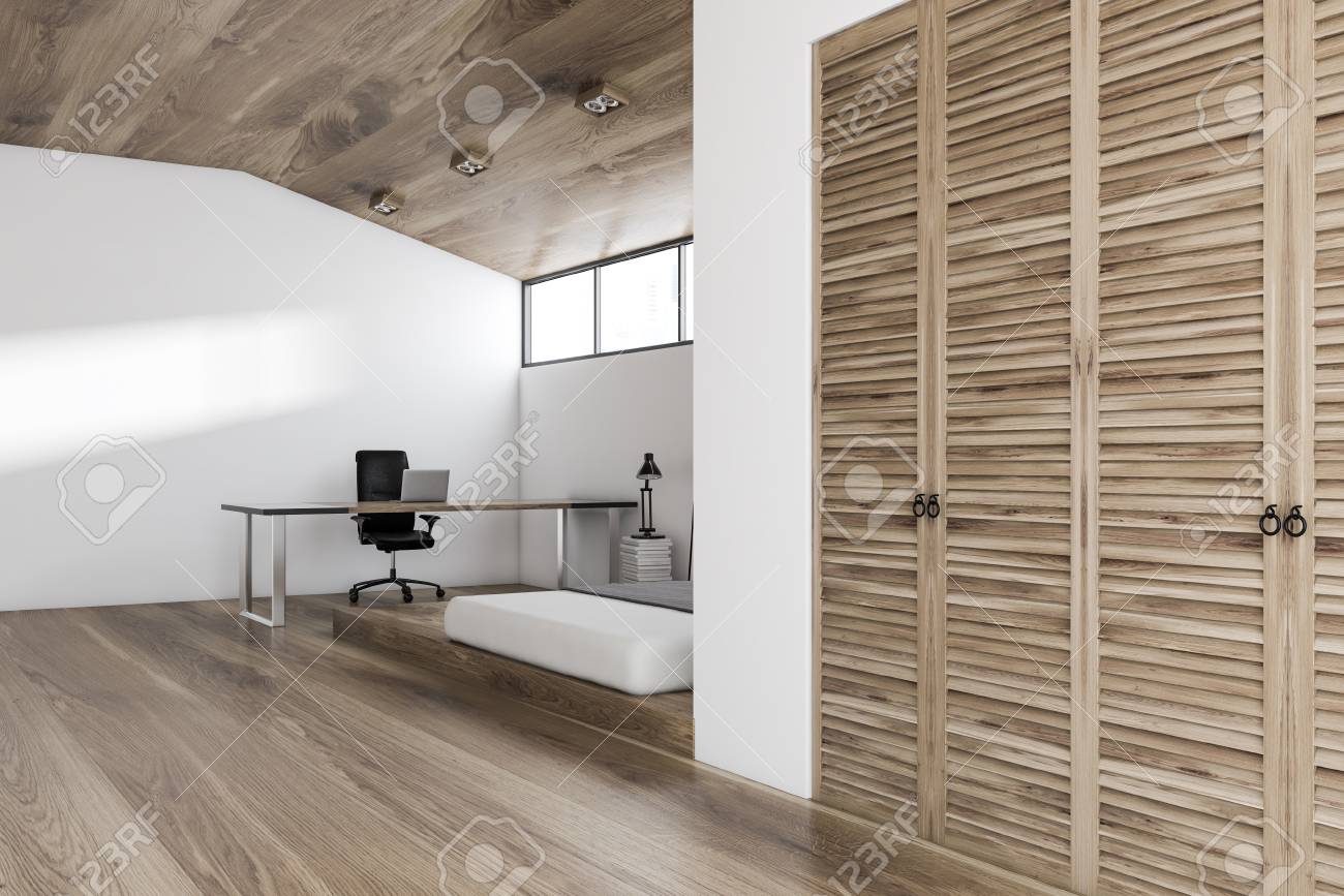 White Wall Bedroom And Home Office Interior With A Wooden Floor