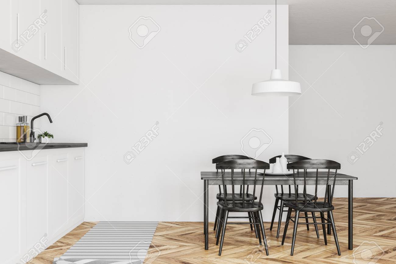 Side View Of A Scandinavian Style Kitchen With White Walls A
