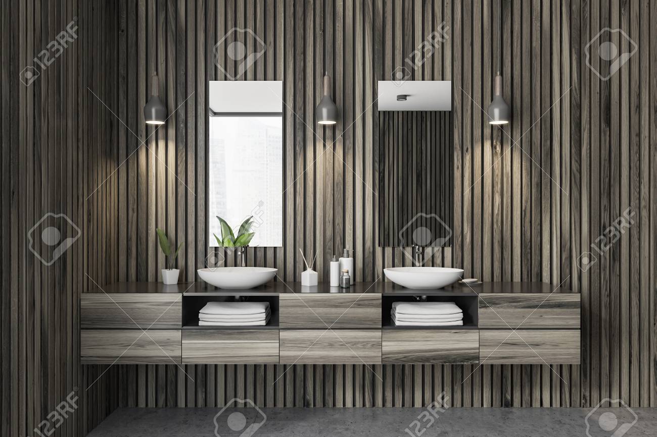 Double Sink In Modern Bathroom Interior With Dark Wooden Walls