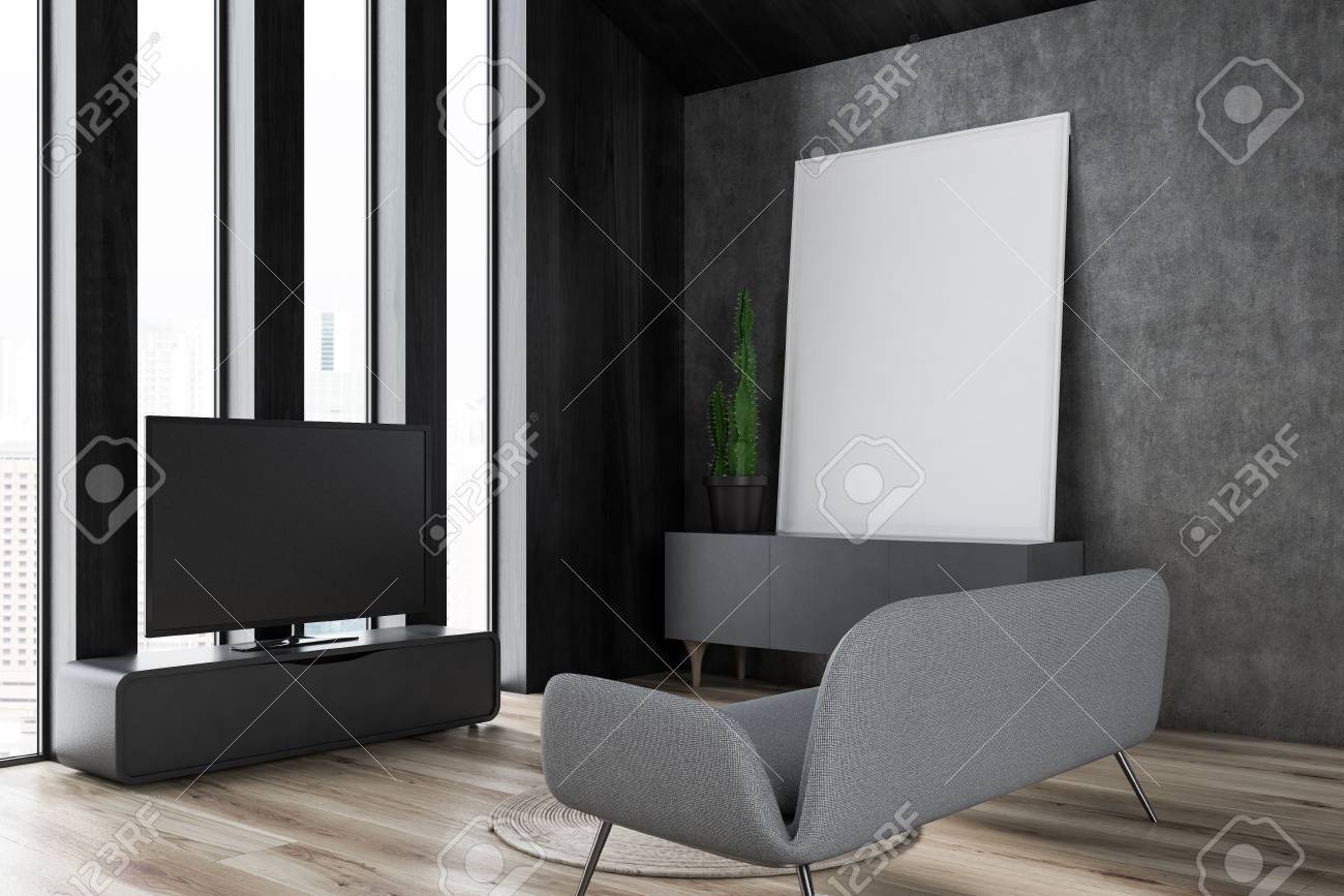 Corner Of Living Room With Gray Walls Wooden Floor Gray Sofa