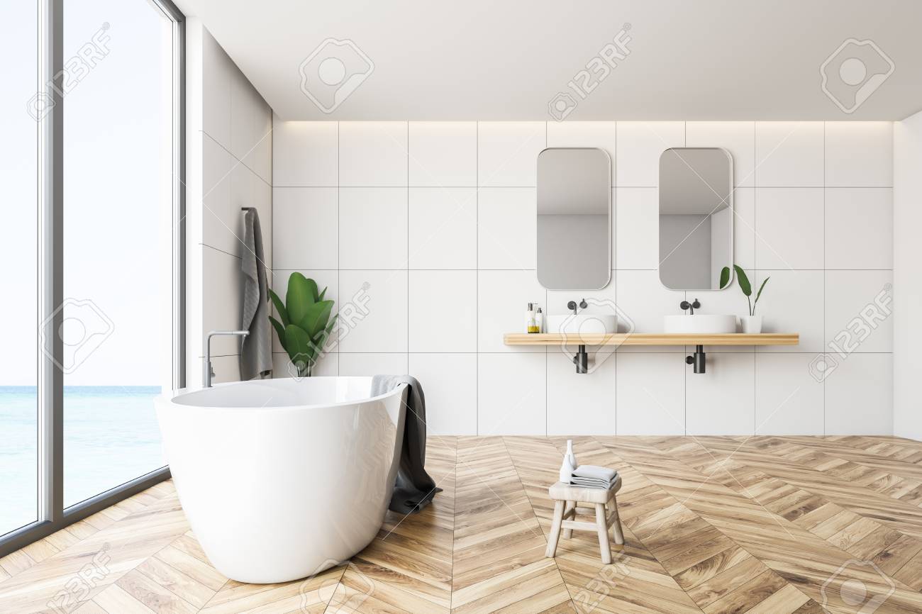 Side View Of Modern Bathroom With White Tile Walls Wooden Floor