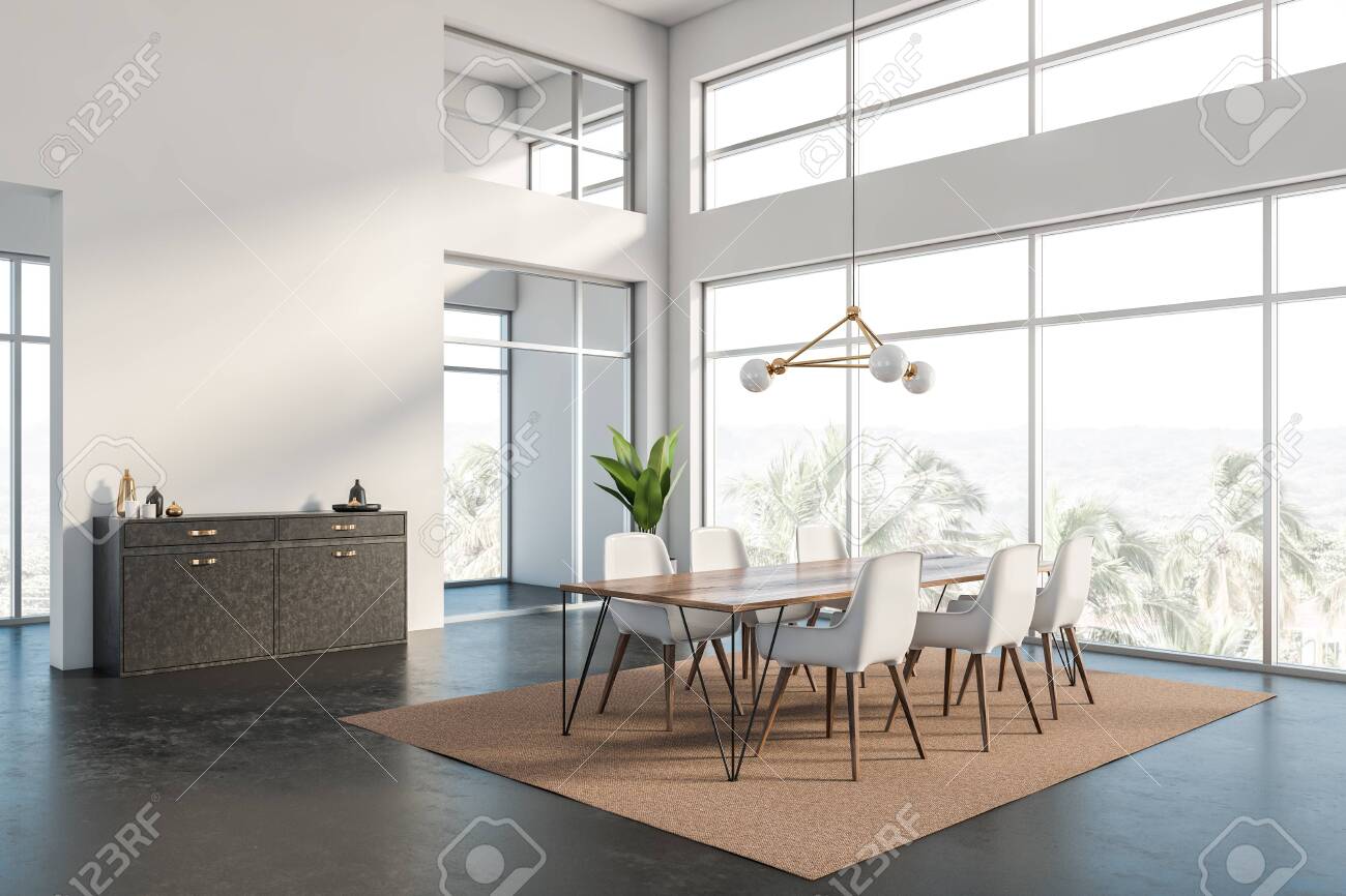 Corner Of Panoramic Dining Room With White Walls Concrete Floor