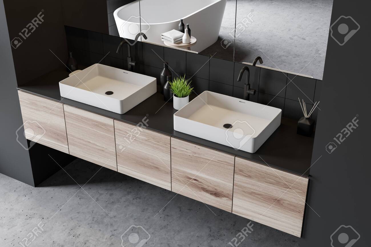 Top View Of Double Bathroom Sink Standing On Wooden Countertop Stock Photo