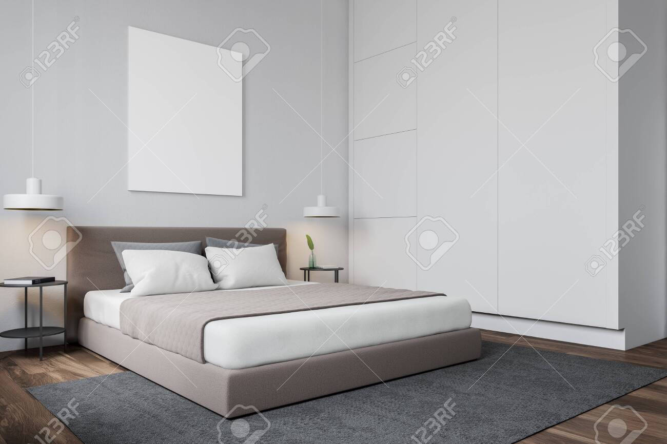 Interior Of Minimalistic Bedroom With White Walls Wooden Floor