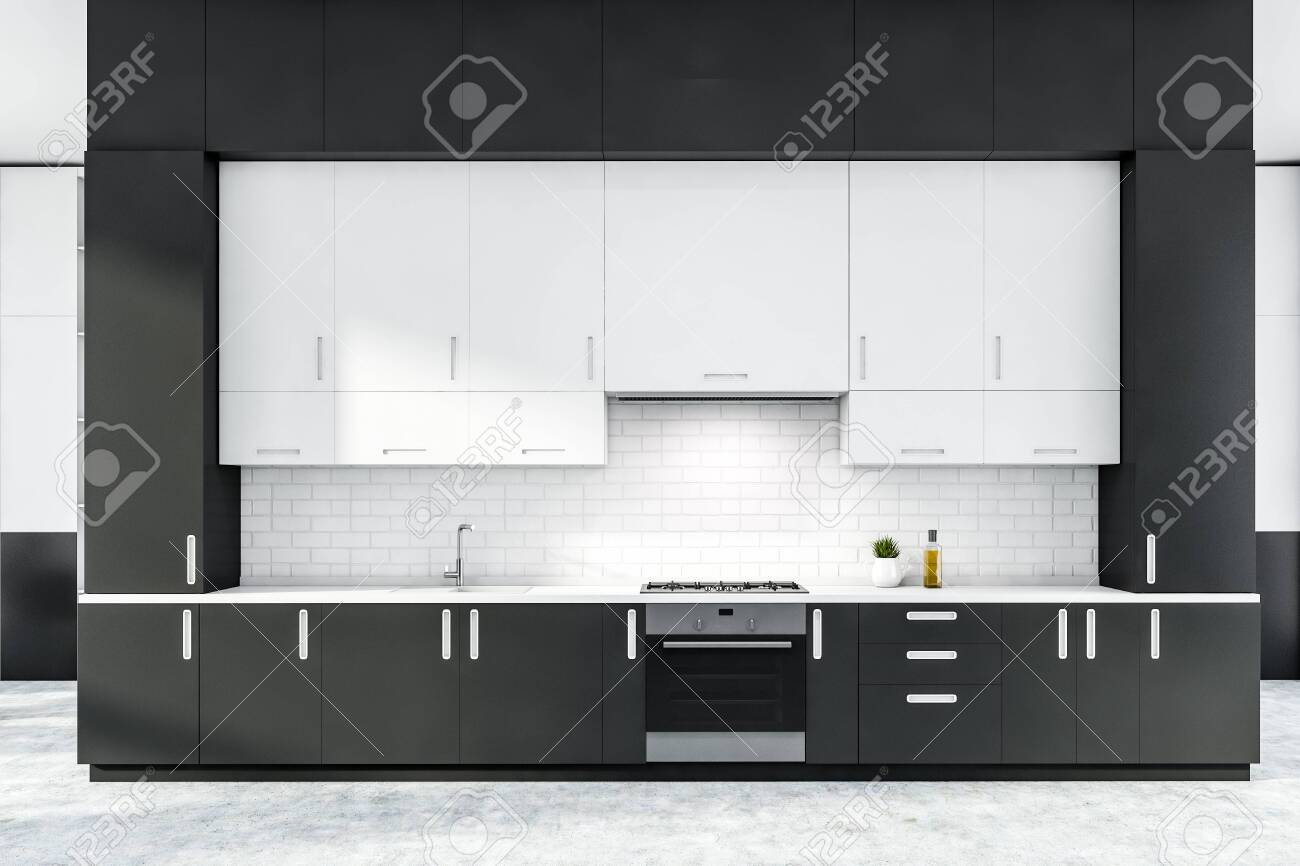 Interior Of Stylish Kitchen With Gray And White Brick Walls