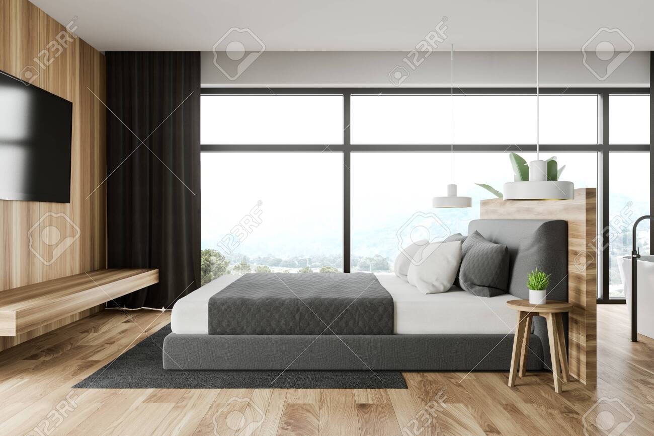 king bed in front of window