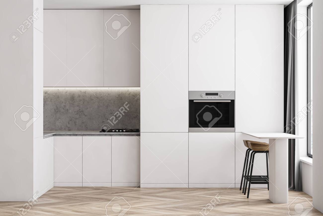 Interior Of Compact Kitchen With White And Stone Walls Wooden Stock Photo Picture And Royalty Free Image Image 141686405