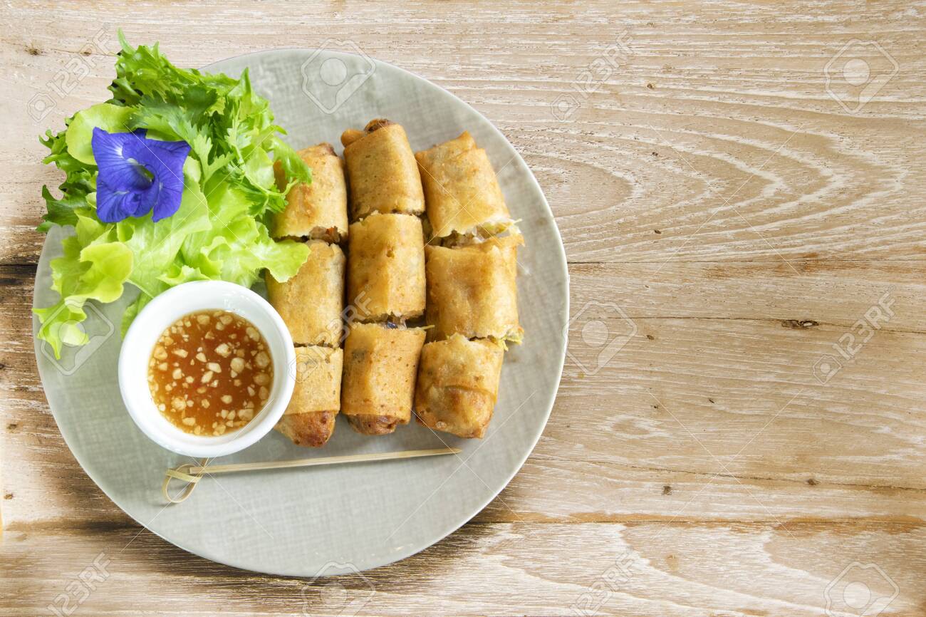 A Plate Of Deep Fried Spring Rolls With Sweet Chili Dip Sauce Stock Photo Picture And Royalty Free Image Image 128219761