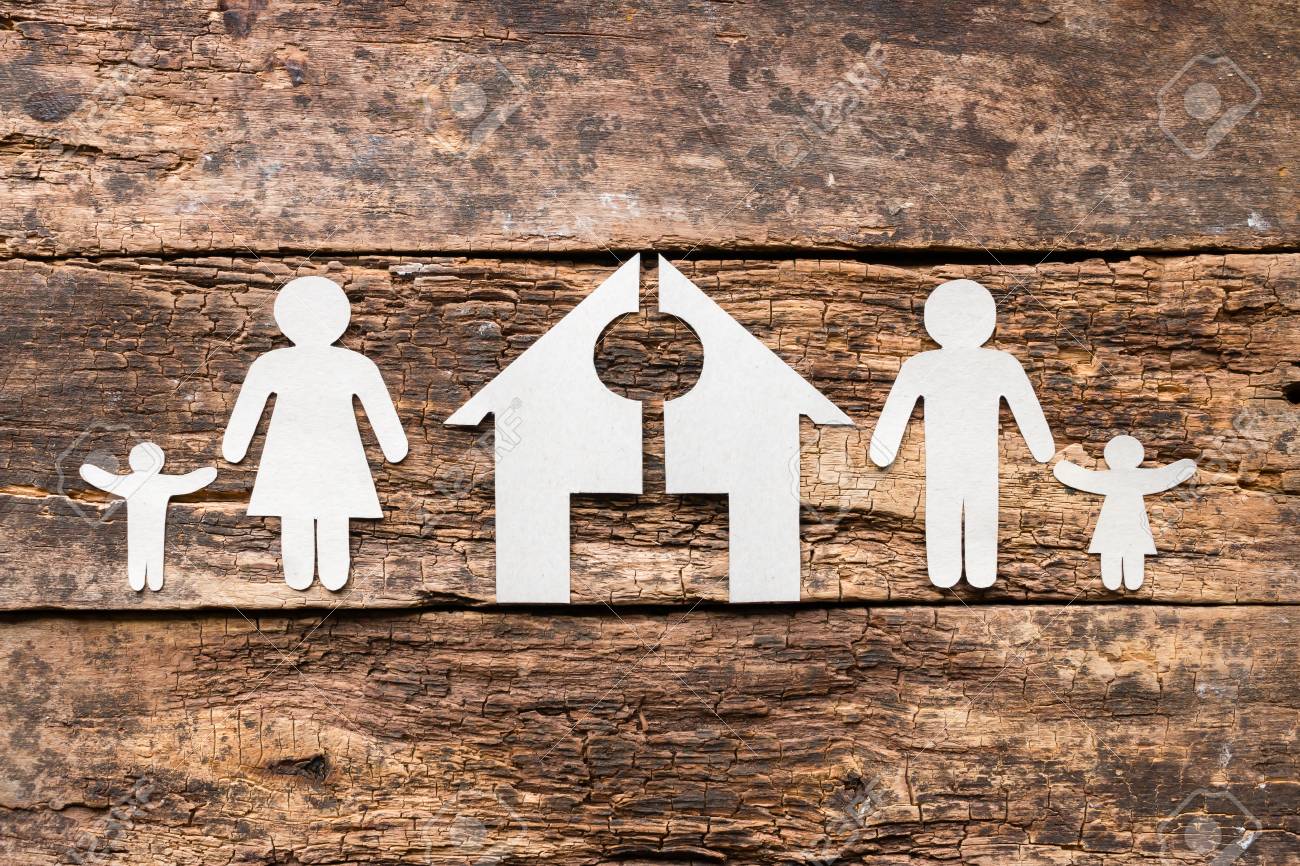 paper family and a cut house concept divorce - 92793656 paper family and a cut house concept divorce - 92793656