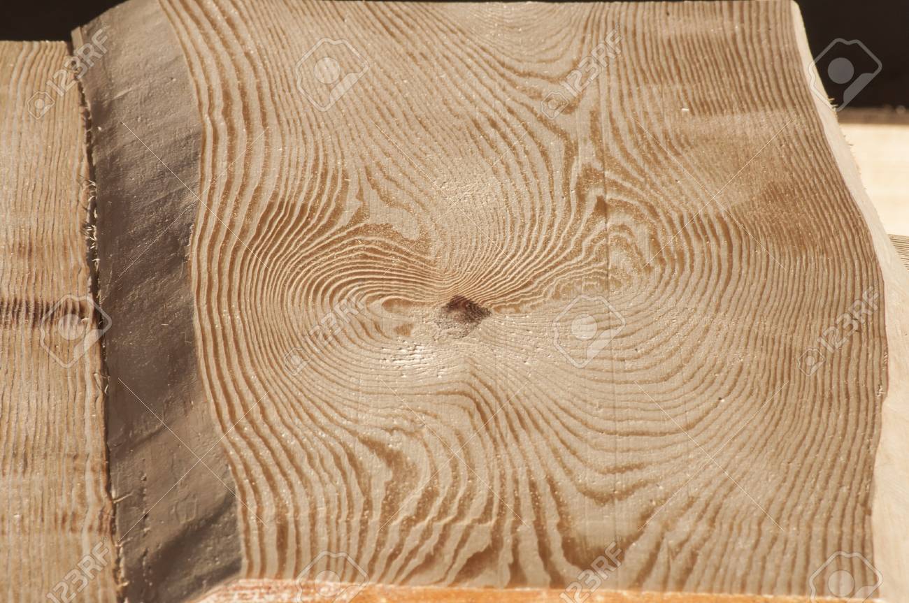 Closeup Of Texture Of Wooden Plank Without Peel From Pine For