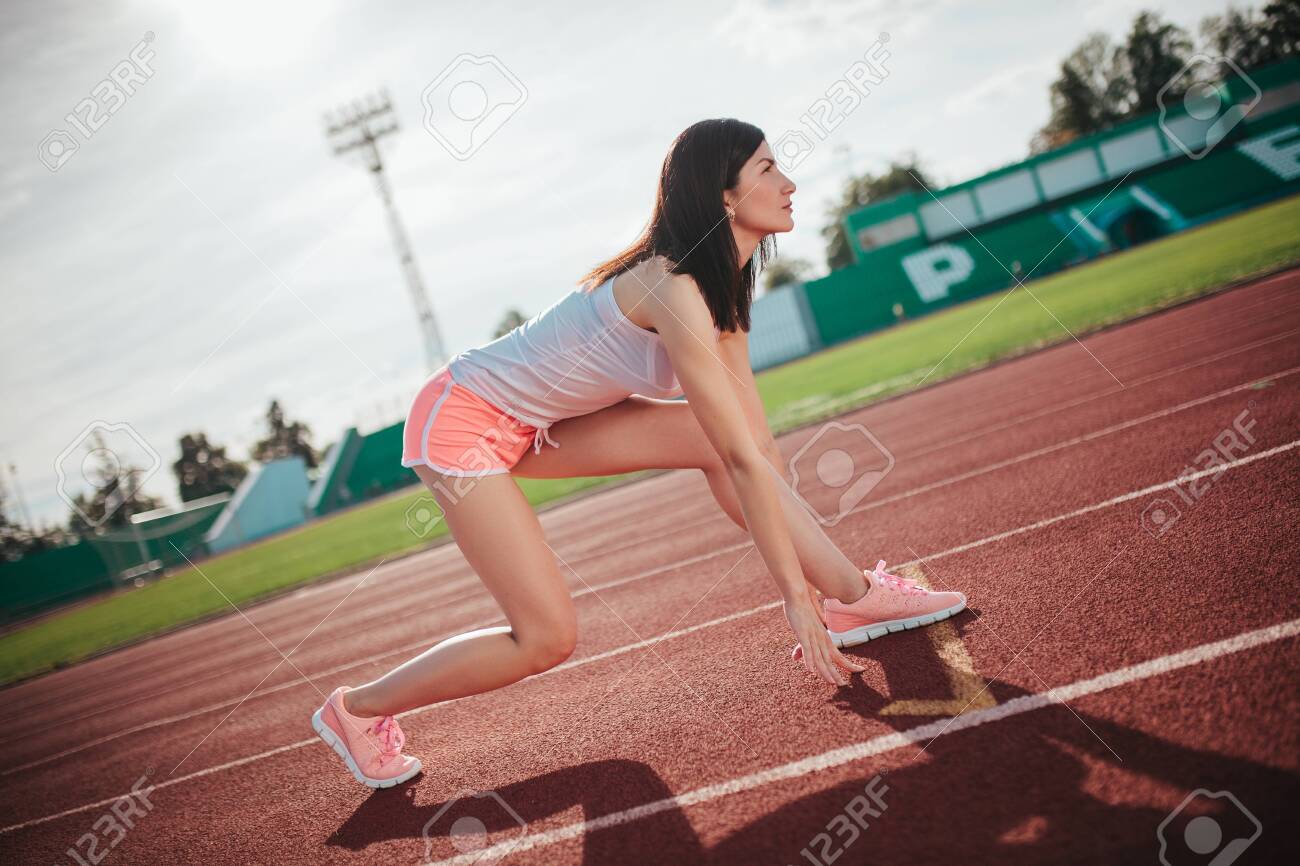 Athletic Woman On Running Track