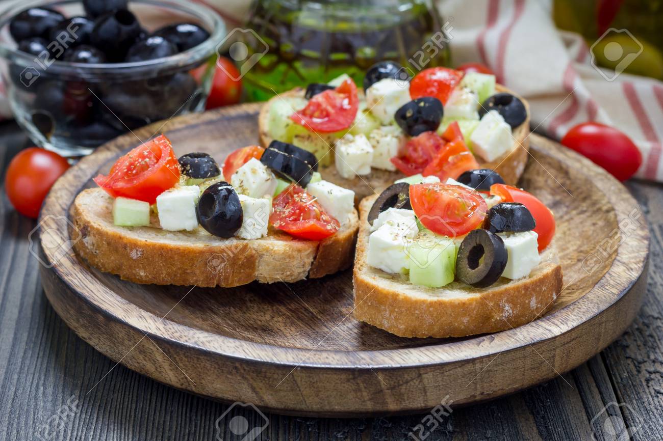 Greek Style Crostini With Feta Cheese Tomatoes Cucumber Olives Stock Photo Picture And Royalty Free Image Image 50249157