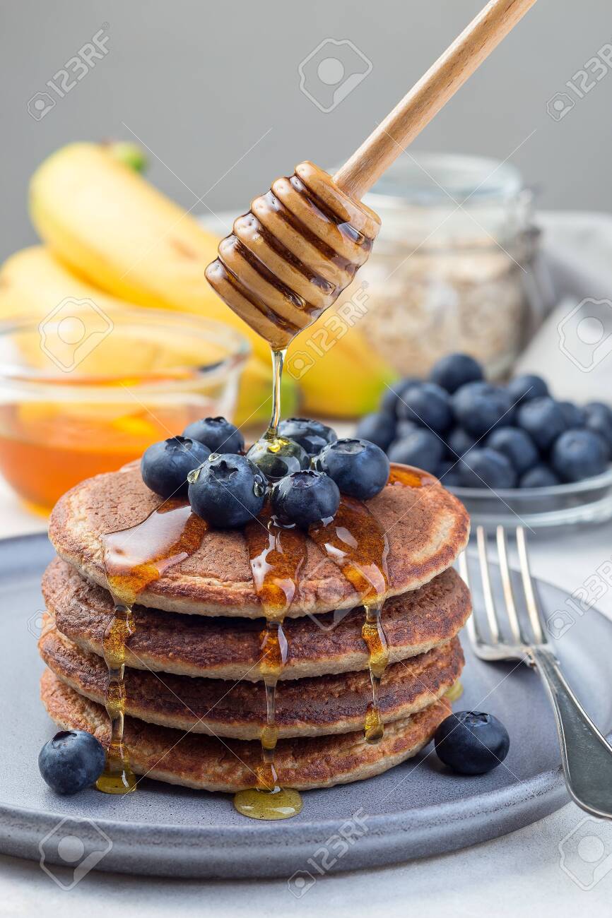 Stack Of Healthy Oatmeal Banana Pancakes Garnished With Blueberry Stock Photo Picture And Royalty Free Image Image 134430711