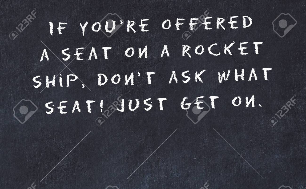 black chalkboard with handwritten wise motivational quote calk board