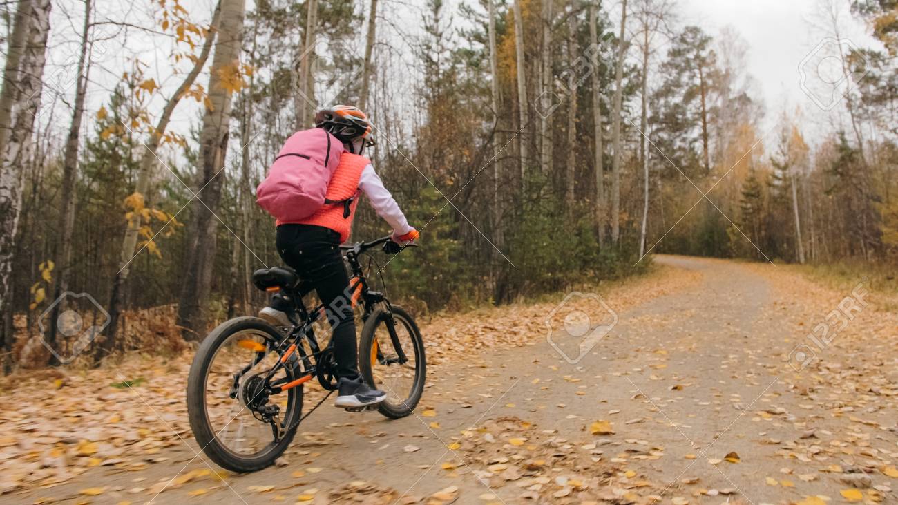 riding bike with backpack