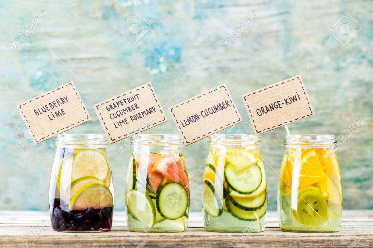 Variety of fruit infused detox water in jars for a healthy diet - 73185469 Variety of fruit infused detox water in jars for a healthy diet - 73185469