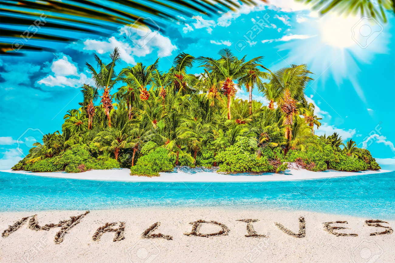 Whole tropical island within atoll in tropical Ocean. Uninhabited and wild subtropical isle with palm trees. Inscription "Maldives" in the sand on a tropical island, Maldives. - 168259299 Whole tropical island within atoll in tropical Ocean. Uninhabited and wild subtropical isle with palm trees. Inscription "Maldives" in the sand on a tropical island, Maldives. - 168259299