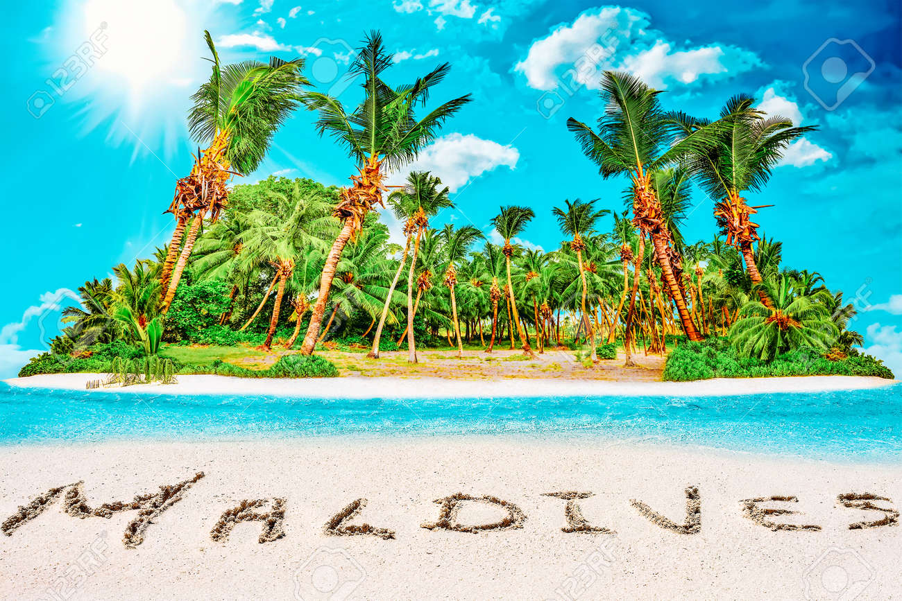 Whole tropical island within atoll in tropical Ocean. Uninhabited and wild subtropical isle with palm trees. Inscription "Maldives" in the sand on a tropical island, Maldives. - 168259308 Whole tropical island within atoll in tropical Ocean. Uninhabited and wild subtropical isle with palm trees. Inscription "Maldives" in the sand on a tropical island, Maldives. - 168259308