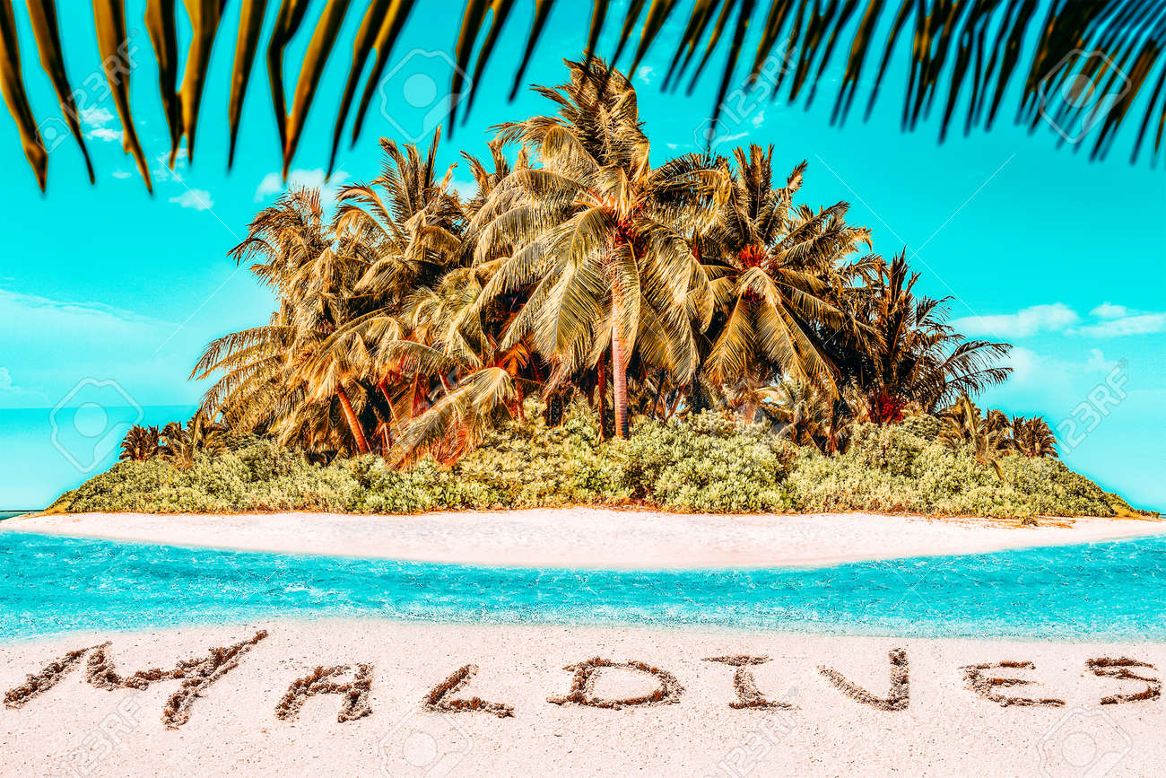 Whole tropical island within atoll in tropical Ocean. Uninhabited and wild subtropical isle with palm trees. Inscription "Maldives" in the sand on a tropical island, Maldives. - 168259314 Whole tropical island within atoll in tropical Ocean. Uninhabited and wild subtropical isle with palm trees. Inscription "Maldives" in the sand on a tropical island, Maldives. - 168259314