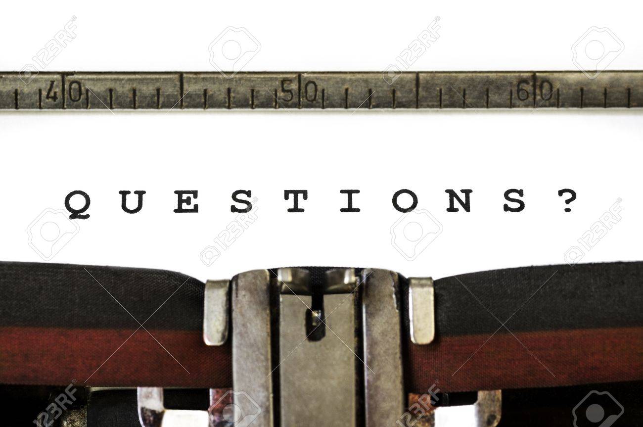 The word Questions? printed on an old typewriter - 11966508 The word Questions? printed on an old typewriter - 11966508
