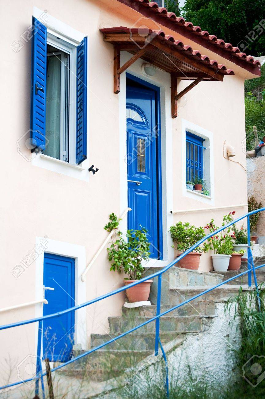 Traditional Greek Houses traditional greek houses with stair case and blue painted stock Traditional Greek Houses traditional greek houses with stair case and blue painted stock