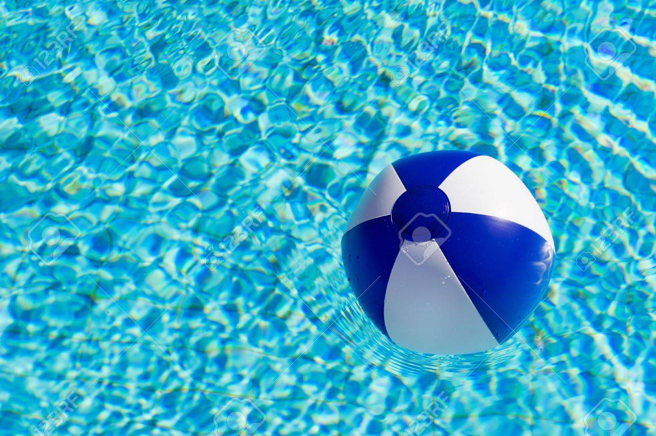 Beach Ball In Water blue and white beach ball in clear water of swimming pool stock Beach Ball In Water blue and white beach ball in clear water of swimming pool stock