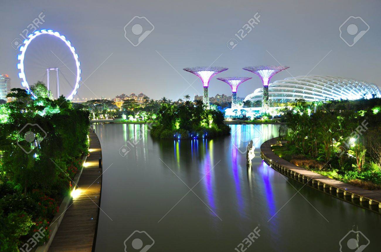 Garden By The Bay Night night scenic view of lake surroundedwalkways at garden Garden By The Bay Night night scenic view of lake surroundedwalkways at garden