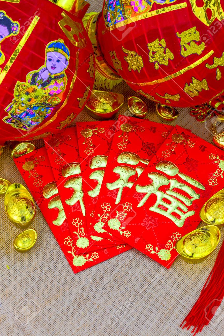 chinese new year ornament on gunny sack red envelope with chinese red letter meaning