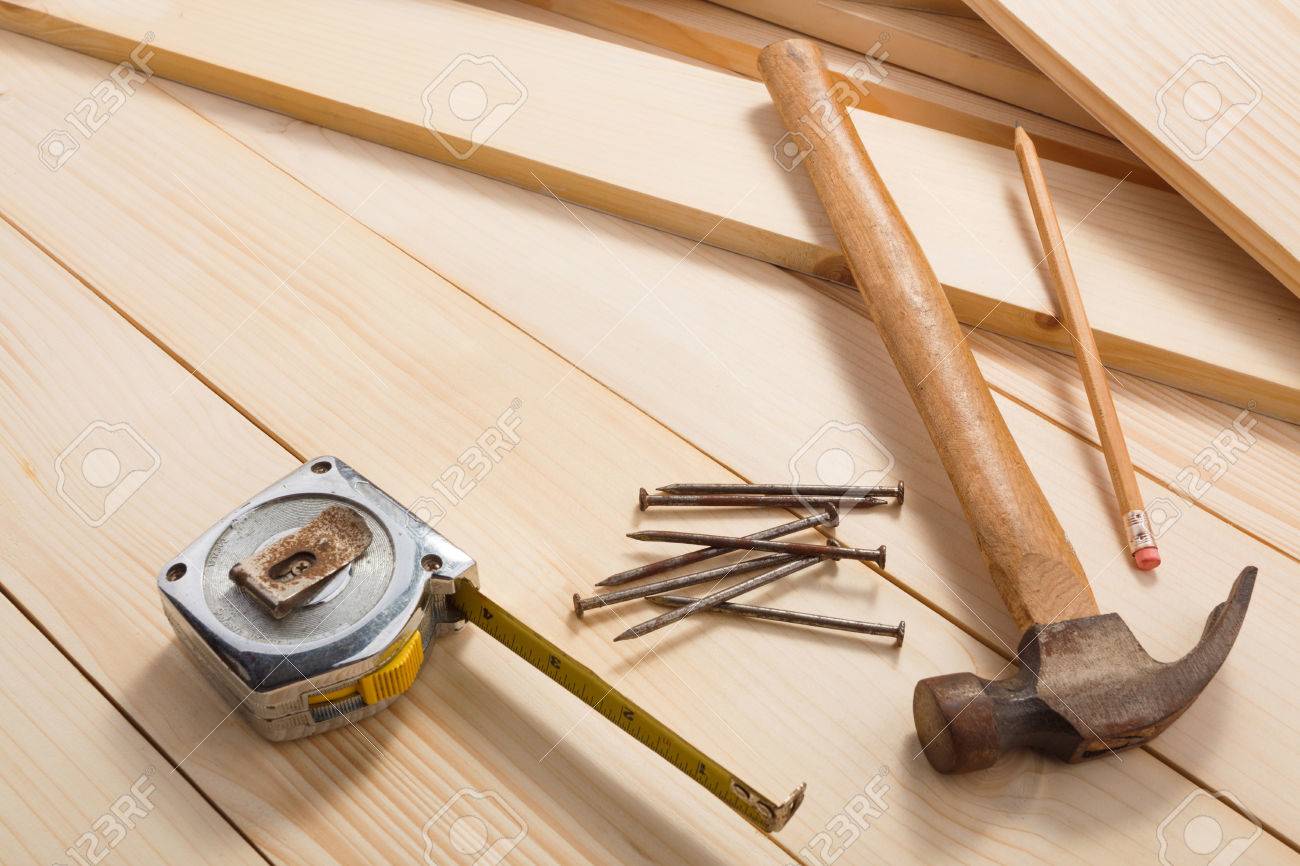 Carpentry tools on wooden background, top view. Empty space for Your text - 82896277 Carpentry tools on wooden background, top view. Empty space for Your text - 82896277