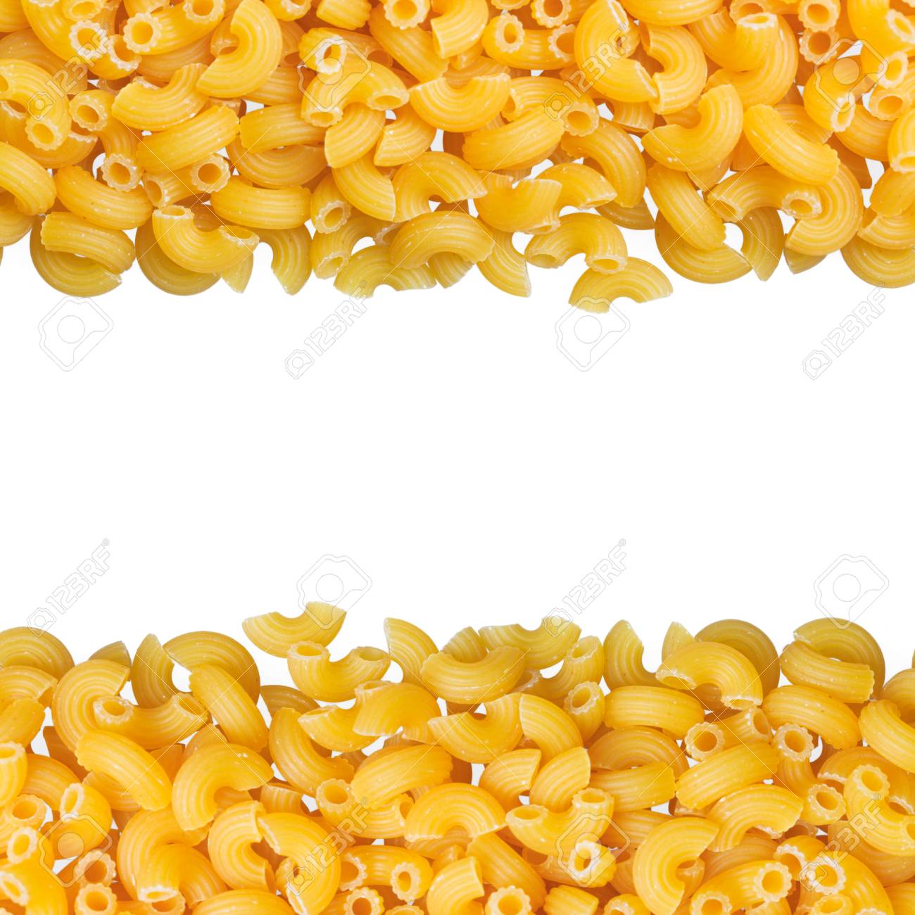 Macaroni angle pasta closeup with copy space and clipping path on white background - 104939764 Macaroni angle pasta closeup with copy space and clipping path on white background - 104939764