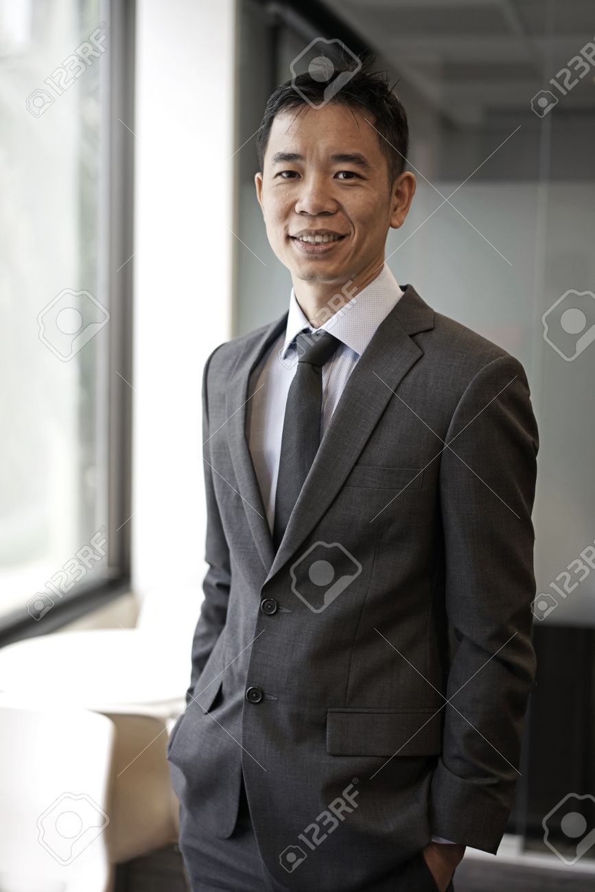 picture of an successfull asian business male in corporate attire