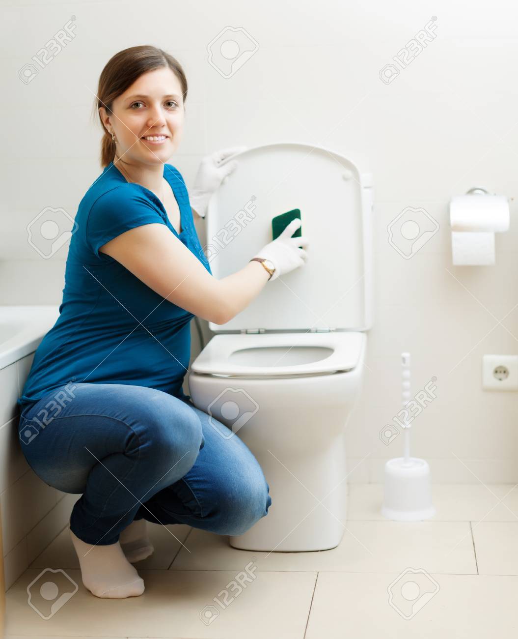 Smiling Woman Cleaning Toilet Seat With Sponge Stock Photo, Picture and  Royalty Free Image. Image 22817634., image size:1055x1300