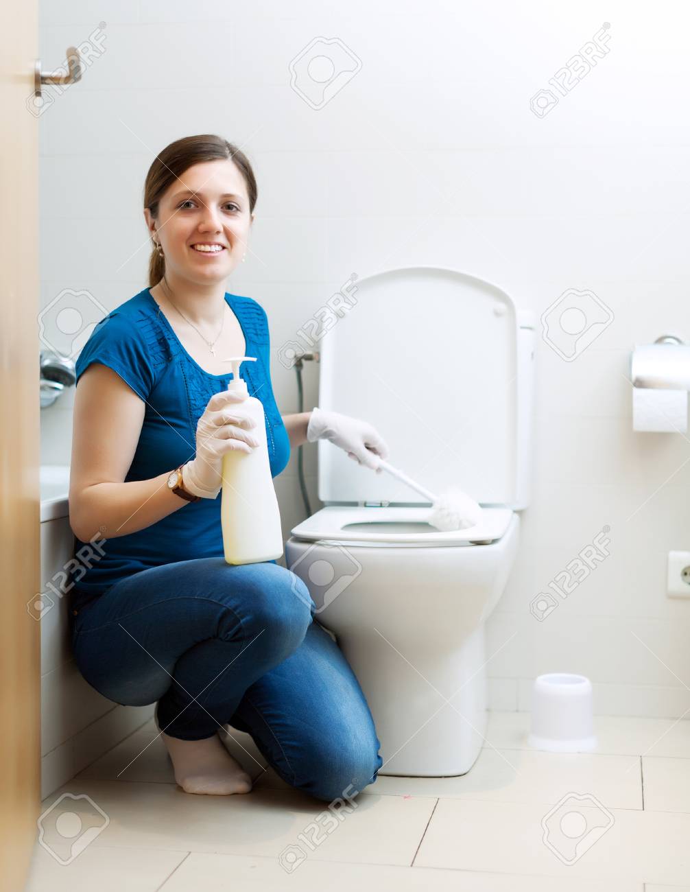 Smiling Young Girl In Blue Cleaning Toilet Bowl With Brush In Stock Photo Picture And Royalty Free Image Image Smiling Young Girl In Blue Cleaning Toilet Bowl With Brush In Stock Photo Picture And Royalty Free Image Image