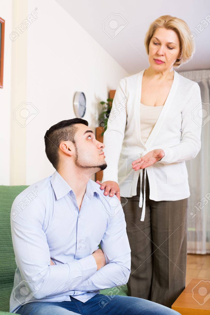 Iakov FilimonovSad Mature Blonde Woman Explaining