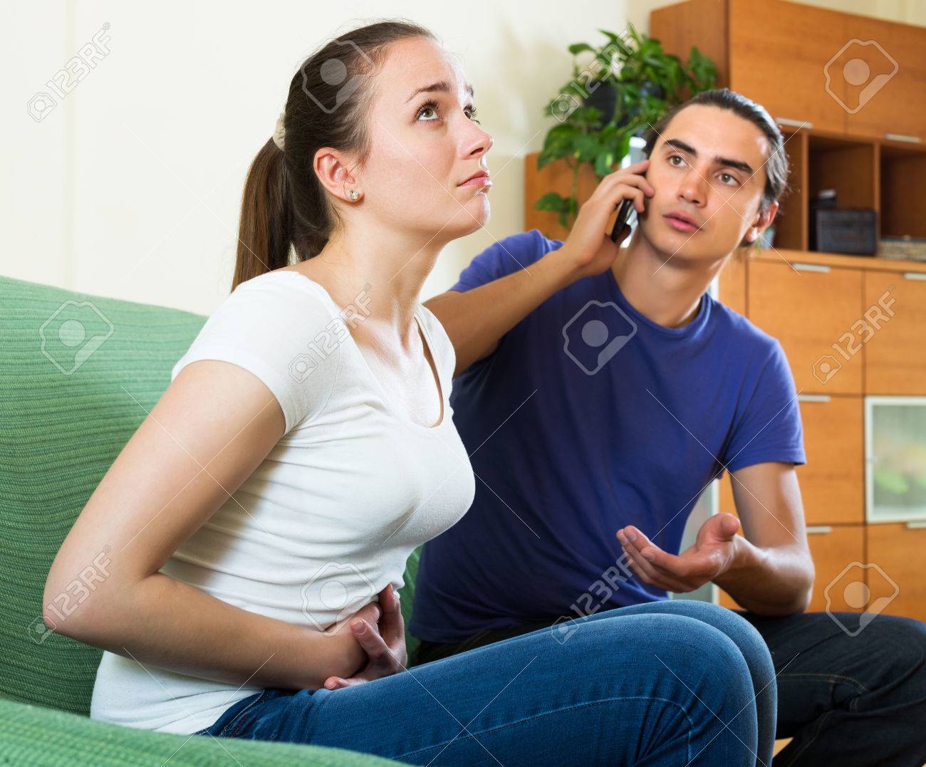 man calling for medical assistance for ill girl stock photo picture free medical assistance