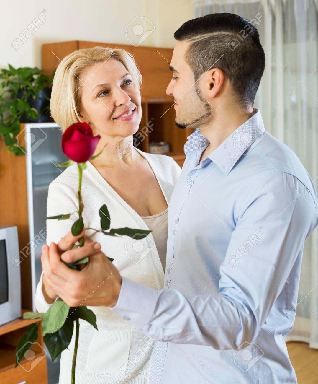 Adult Russian Son Asking Senior Mother To Dance At Home Stock Photo,  Picture and Royalty Free Image. Image 48966898.