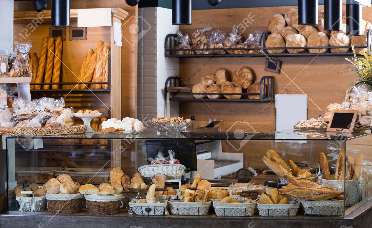 Buns Baguettes And Other Fresh Bread At Bakery Display Buns Baguettes And Other Fresh Bread At Bakery Display