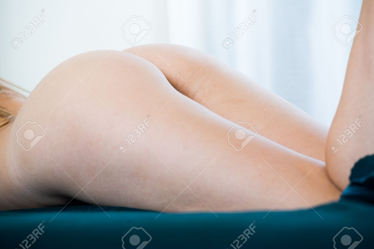 Female Naked Ass In Bed With Silk Linen Close Up Stock Photo, Picture and  Royalty Free Image. Image 57714582.