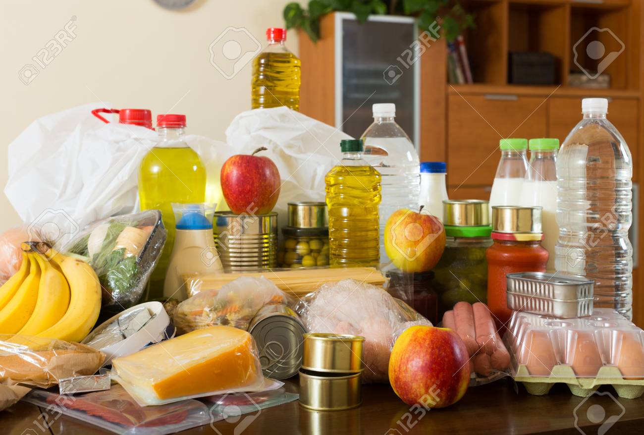 Foodstuffs Of Supermarket On Table In Home Interior Stock Photo, Picture And Royalty Free Image. Image 82048397.