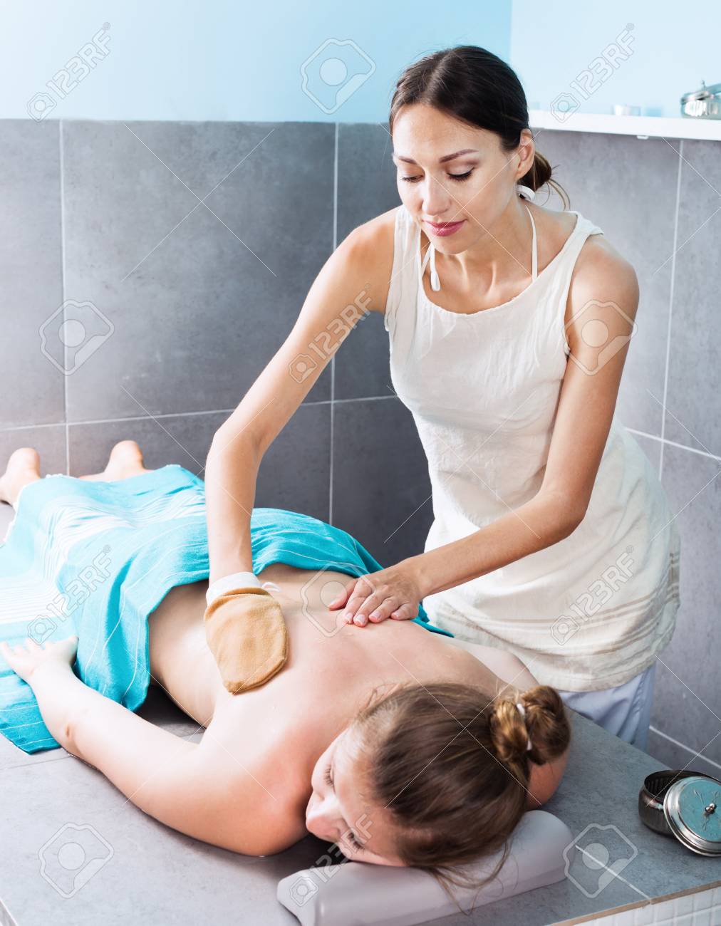 Female Massage Therapist Massaging Positive Woman Stock Photo 98016318 Female Massage Therapist Massaging Positive Woman Stock Photo 98016318