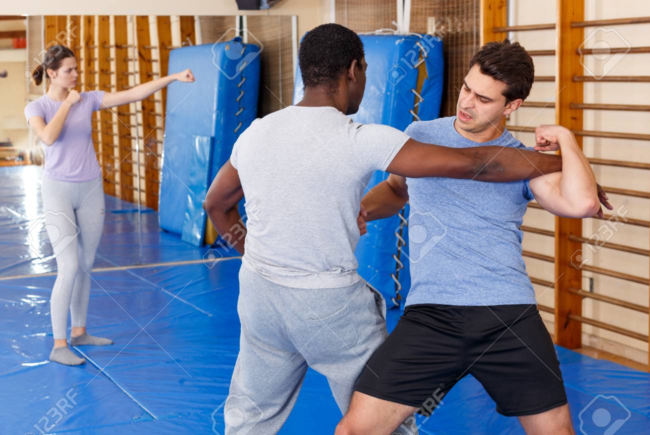 Two Young Men Practicing Self Defense Techniques In Sports Club Stock Photo Picture And Royalty Free Image Image Two Young Men Practicing Self Defense Techniques In Sports Club Stock Photo Picture And Royalty Free Image Image