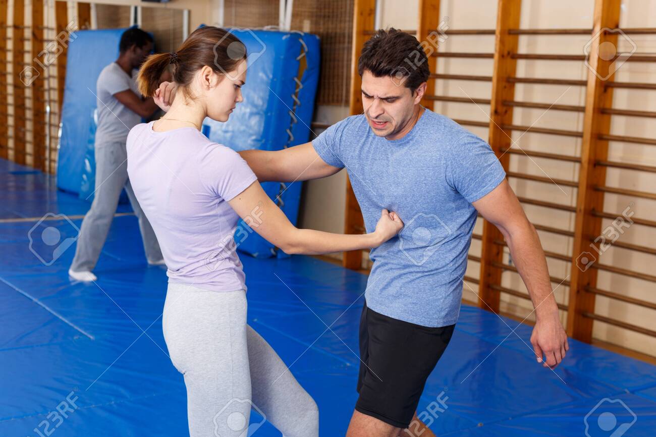 Woman And Man Practicing Self Defense Techniques In Gym Stock Photo Picture And Royalty Free Image Image