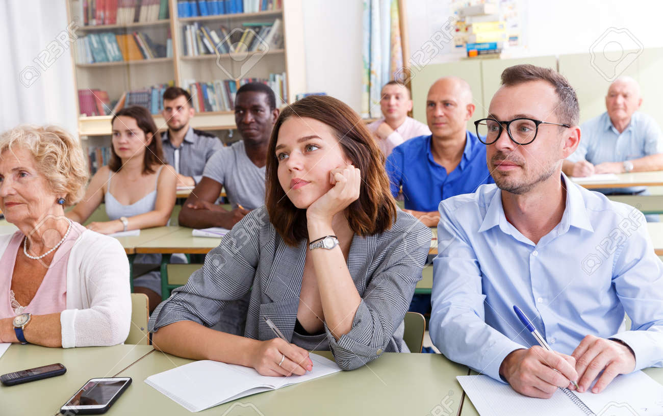Glad Students Mixed Age Listening Task For Exam In The Classroom Stock  Photo, Picture and Royalty Free Image. Image 146426837., image size:1300x816
