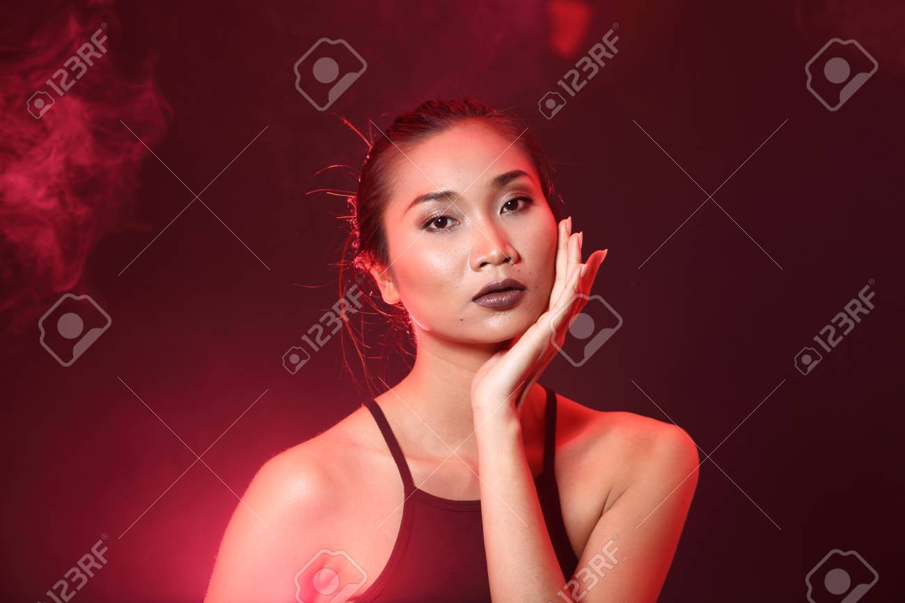 Smoking Tan Skin Asian Woman Black Hair Dark Lip With Dense Fluffy