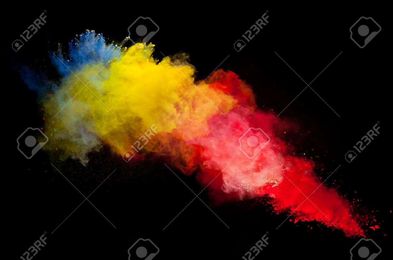 freeze motion of colored dust explosion isolated on black background