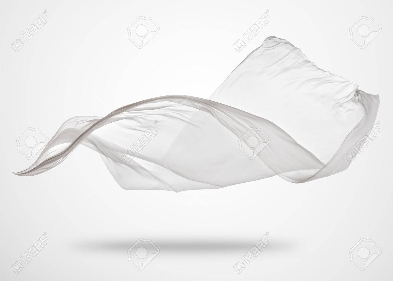 滑らかなエレガントな透明な白い布は 灰色の背景に分離 飛んでファブリックのテクスチャです の写真素材 画像素材 Image